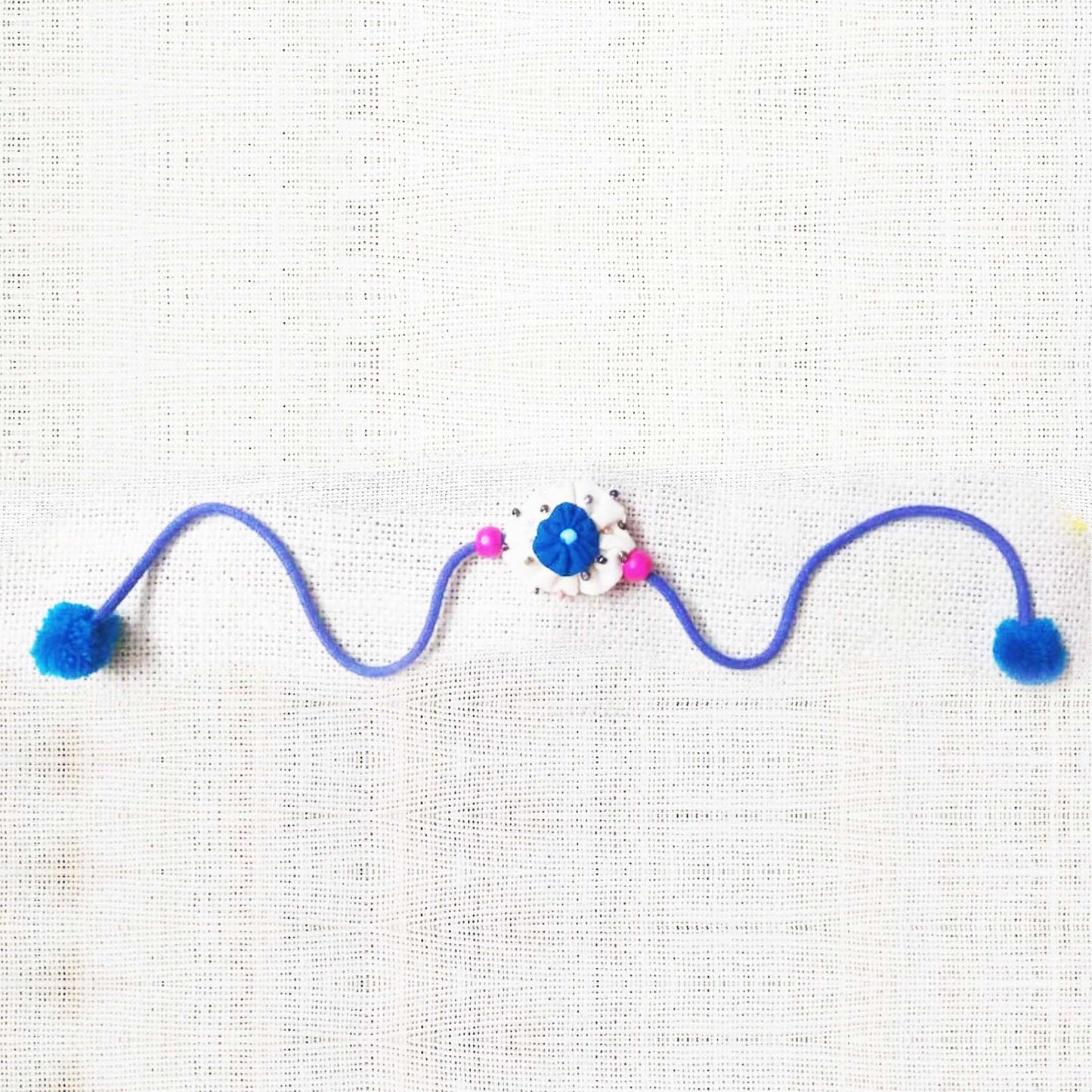 White Flower Rakhi