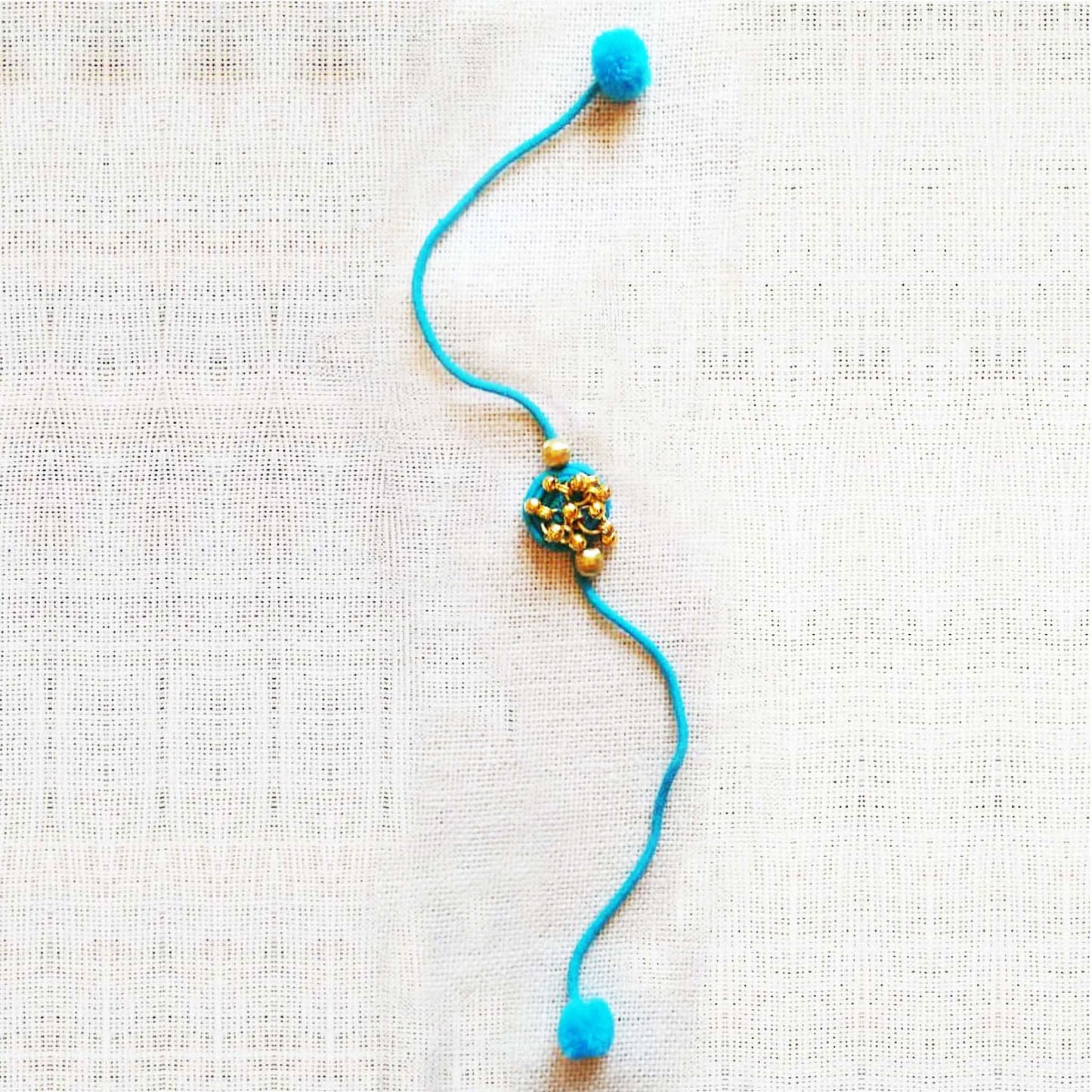 Turquoise Gold Rakhi