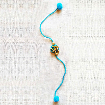 Turquoise Gold Rakhi