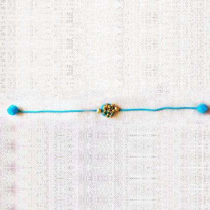 Turquoise Gold Rakhi