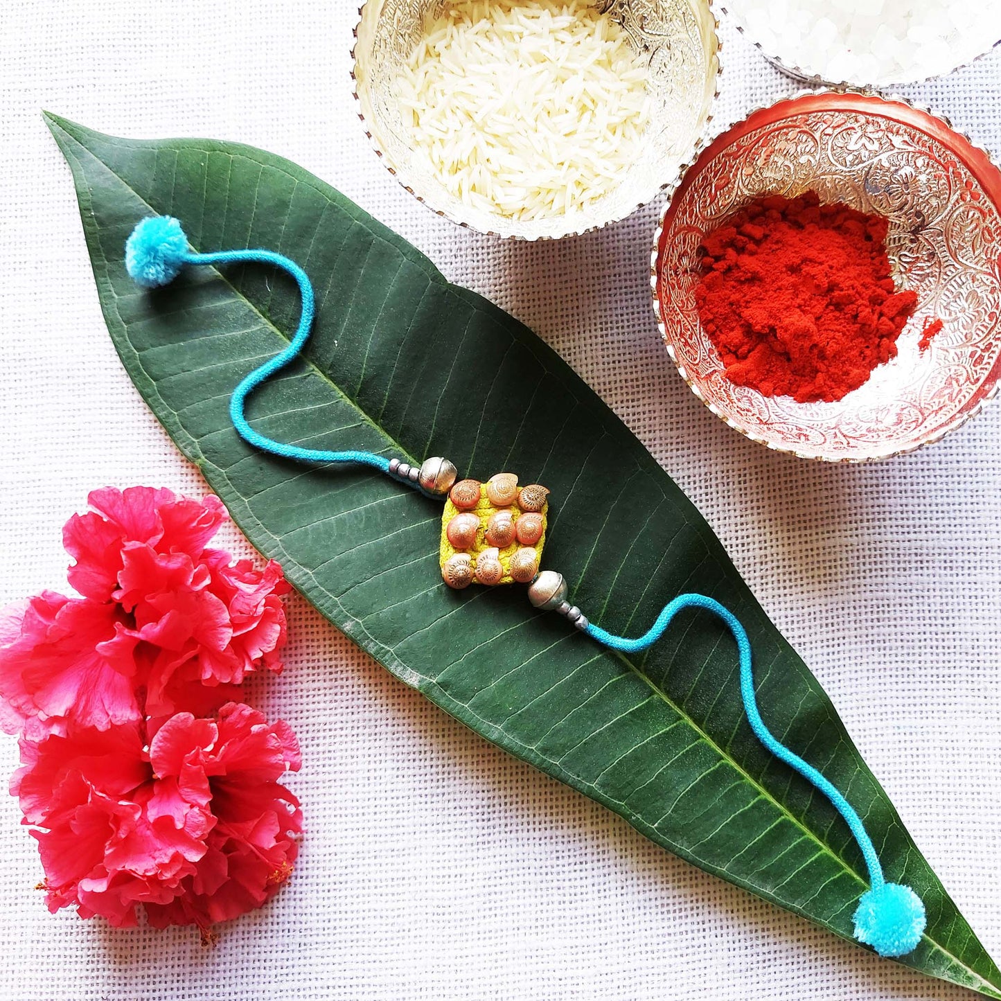 Yellow Little Shell Rakhi