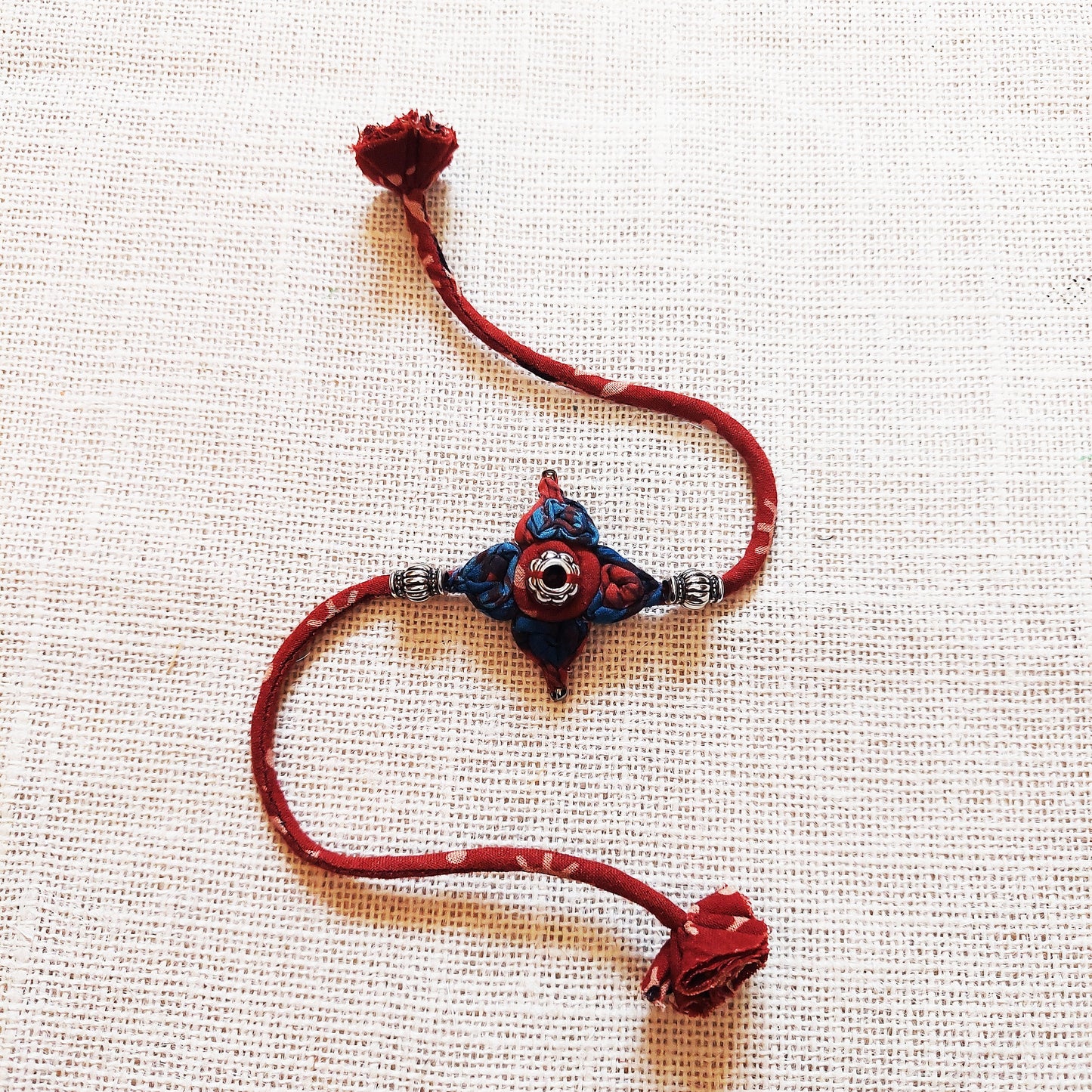 Flower Ajrakh Rakhi