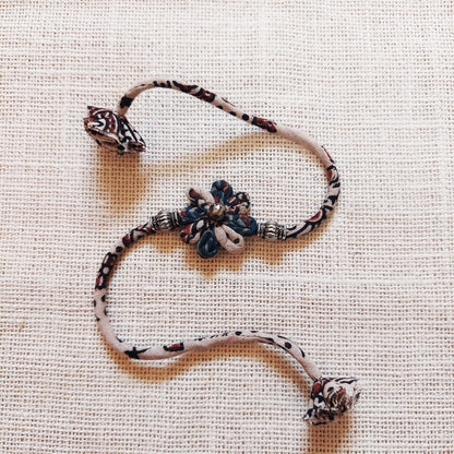 Floral Ajrakh Rakhi