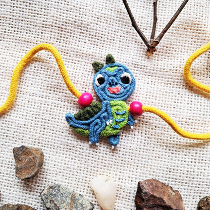 Teal Dino Rakhi