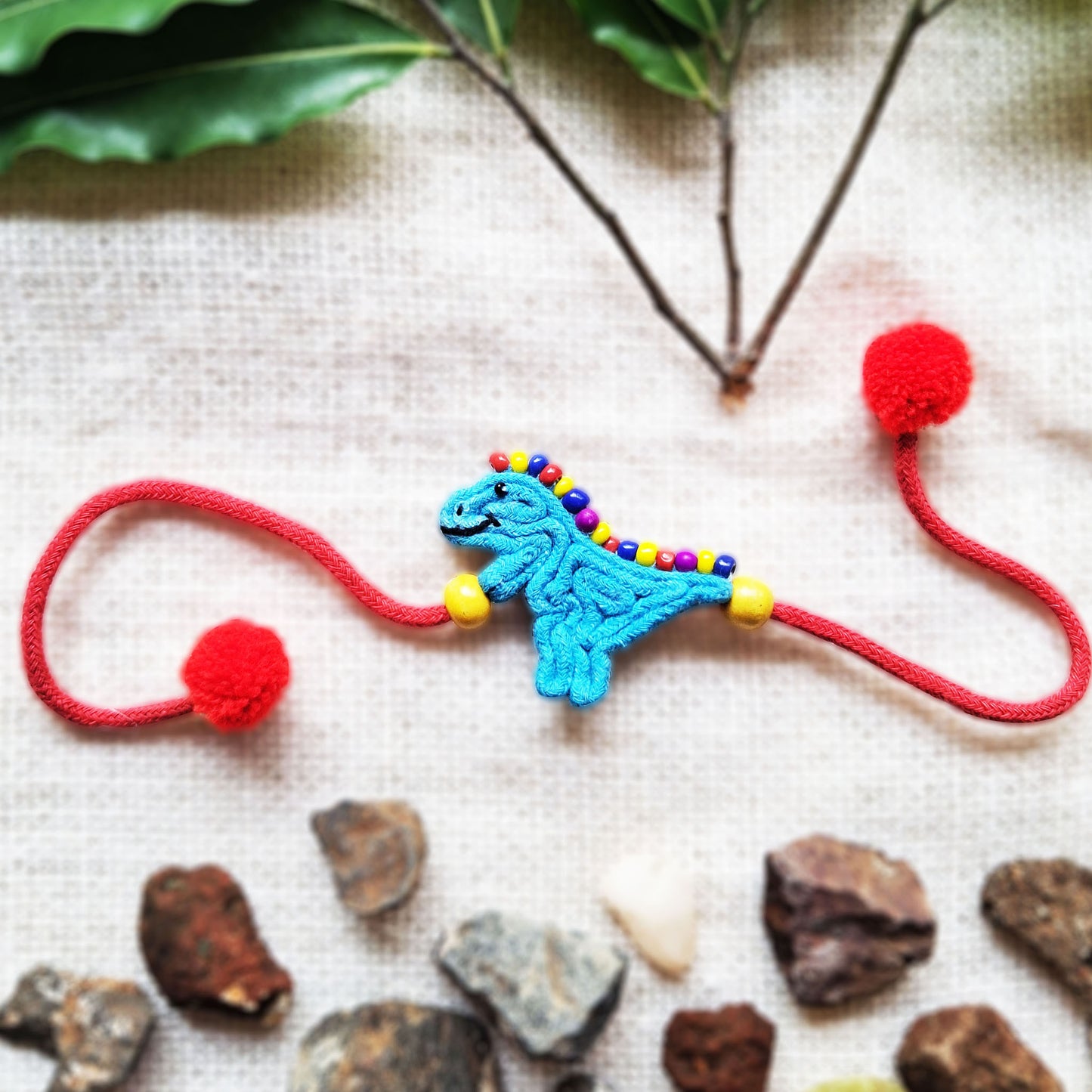 Playful Dino Rakhi
