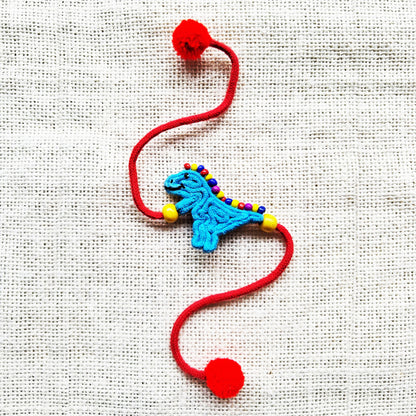 Playful Dino Rakhi