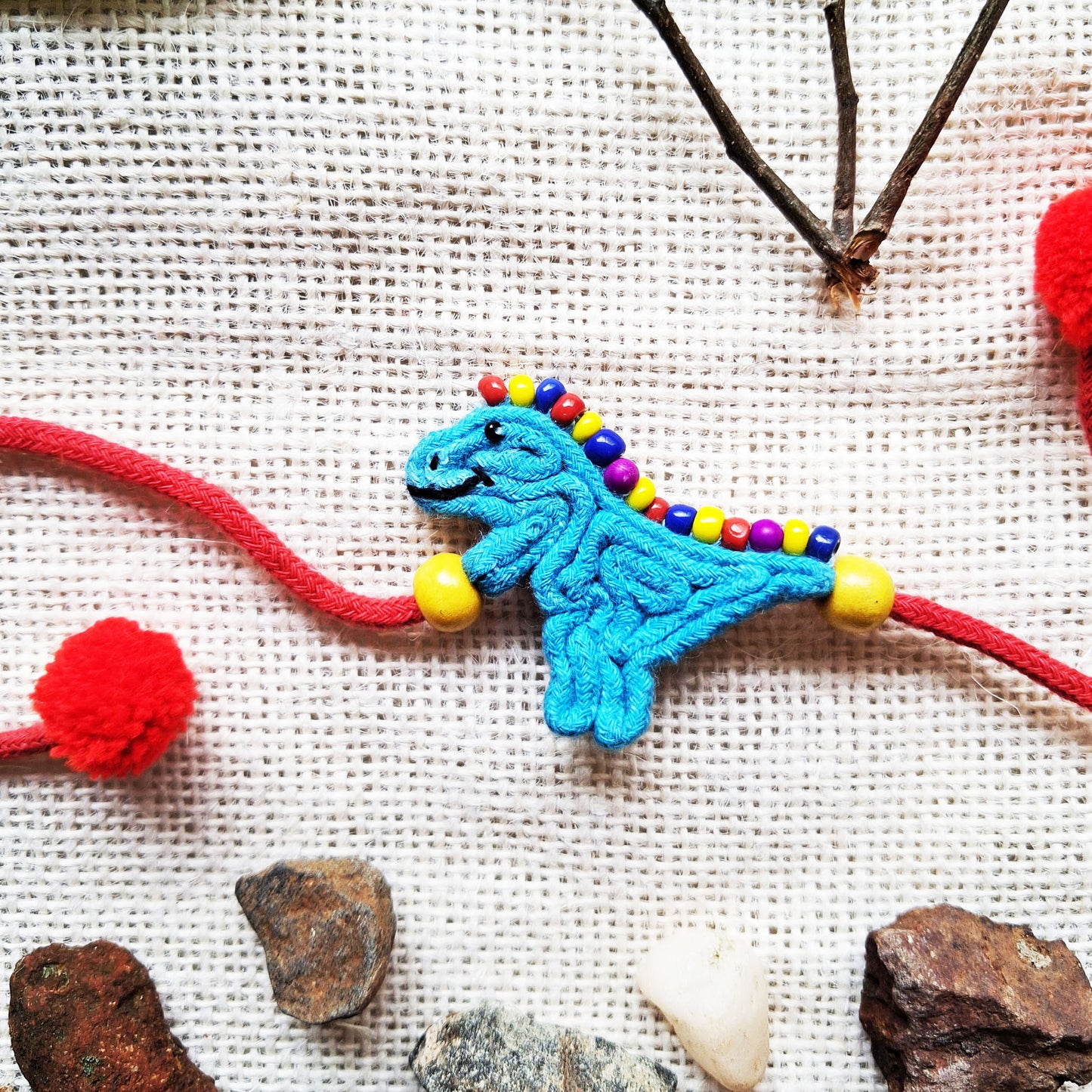 Playful Dino Rakhi