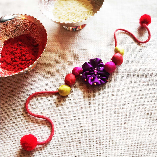 Purple Silk Flower Rakhi