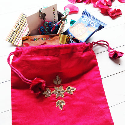 Silken Potli Hamper for Bhaiya Bhabhi