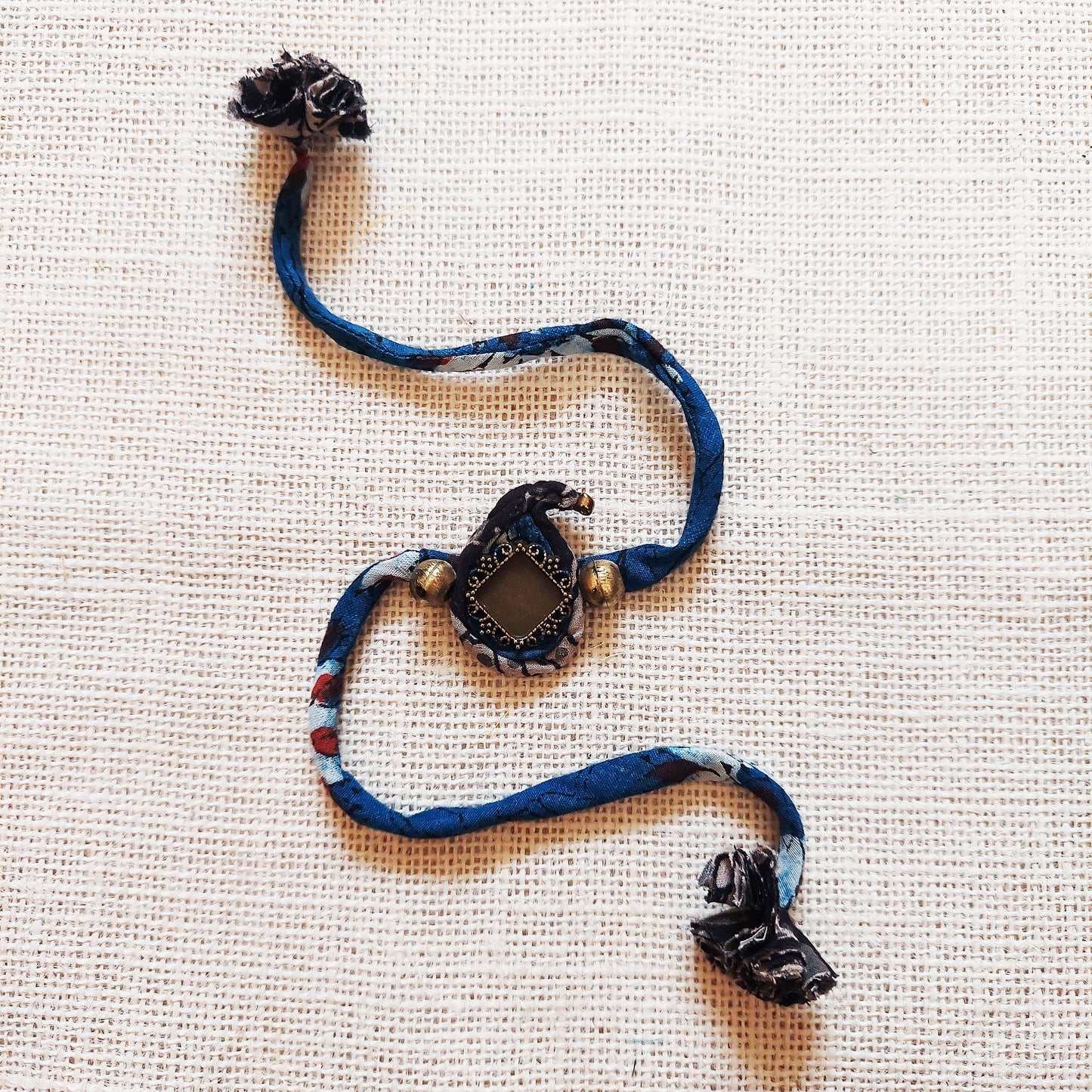 Ambi Ajrakh Rakhi Lumba Set