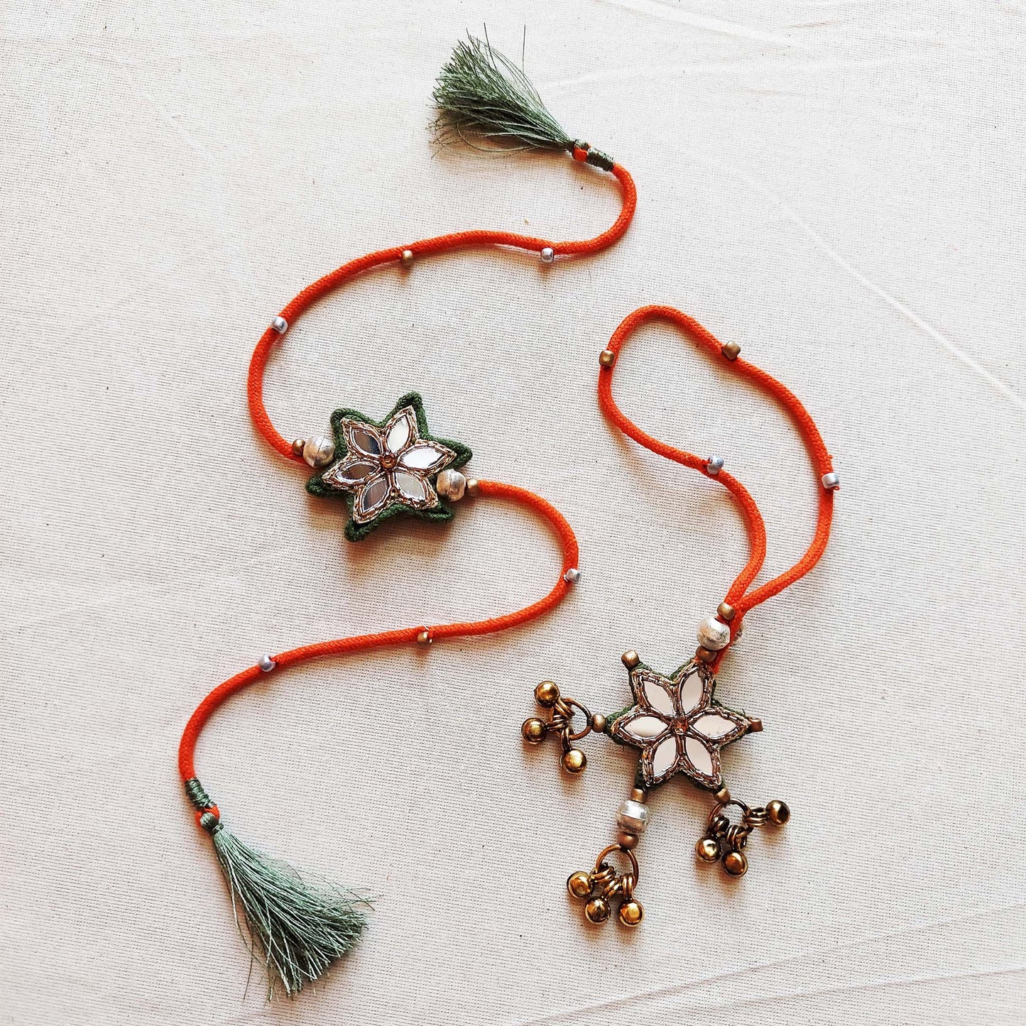 Orange and Green Sitara Rakhi Lumba set