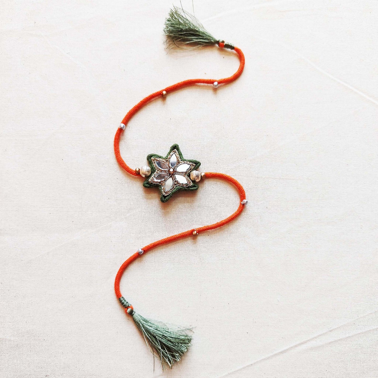 Orange and Green Sitara Rakhi Lumba set